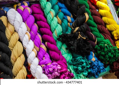 Colorful Silk Pashmina Scarves Nicely Rolled Up For Sale At A Street Market In Mysore, India. Souvenir, Indian Traditional Shawls