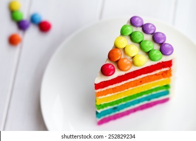 Colorful Slice Of Rainbow Layer Cake