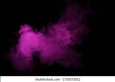 Colorful Smoke Close-up On A Black Background. Blurred Pink Cloud Of Smoke.