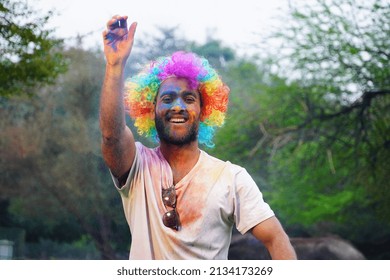 Colorful Smoke Fog Holi Gulal, Gulal Splash Holi, Portrait Of Young Indian Boy Having Pitchakari Of Holi Playing Holi Images