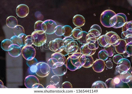 Similar – Image, Stock Photo Nu blow times fast ! (Boy portrait with soap bubbles, detail)