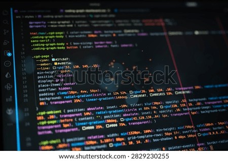 Colorful source code on dark computer screen represents programming, software development, web coding, developer workflow, debugging, application design and modern digital technology.