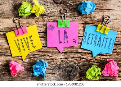 Colorful speech bubbles shaped paper with the French text "vive la retraite" means long live retirement - Shutterstock ID 1786081205