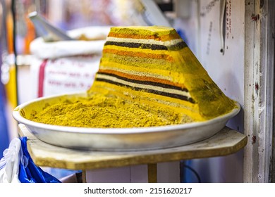 A Colorful Spice Mound Display In The Street Market