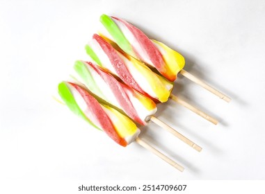 colorful spiral popsicles isolated on white background - Powered by Shutterstock