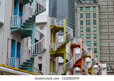 Colorful Spiral Staircase In The Back Alley In Singapore