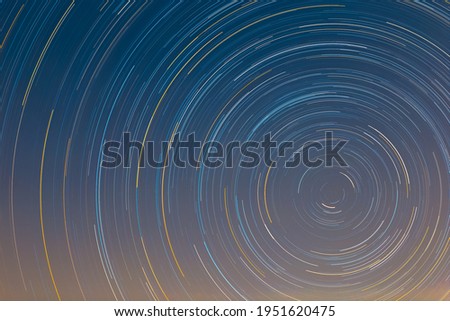 Colorful Spiral Star trails wallpaper background