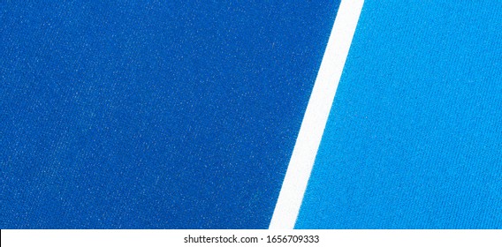 Colorful Sports Court Background. Top View Light Blue And Navy Blue Field Rubber Ground With White Line Outdoors