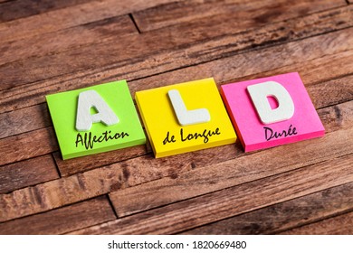 Colorful square papers with wooden white letters for the acronym ALD means LDD Long Duration Disease - Shutterstock ID 1820669480