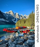 Colorful Stack of Canoes at Lake Moraine in Alberta Banff Canada Canadian Rockies