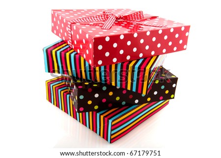 Colorful stack with presents with stripes and dotts
