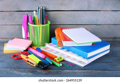 Colorful stationery on wooden background - Shutterstock ID 264955139