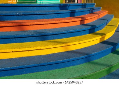 Colorful step of stairs painted.Outdoors crude concrete color background with anti-slip rubber cover.