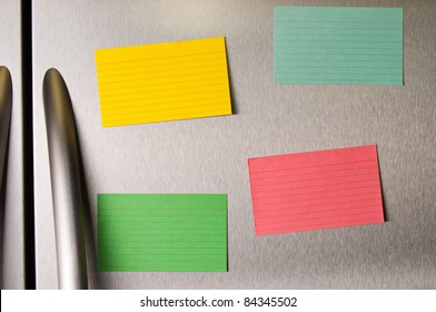 Colorful Sticky Notes On A Stainless Steel Refrigerator.