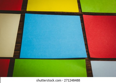 Colorful Sticky Post Its On Wooden Background