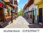 colorful street of guatape colonial town, colombia