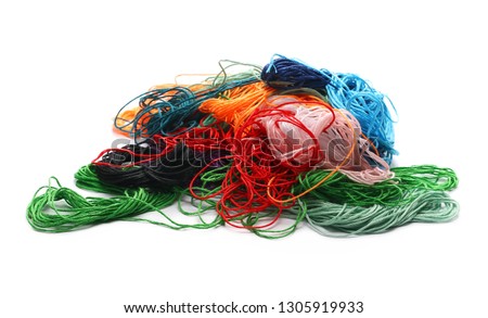 Colorful strings for sewing and knitting, isolated on white background