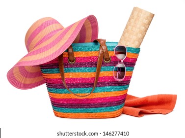 Colorful Striped Beach Bag With A Straw Hat Sun Mat Towel And Sunglasses, Isolated On White