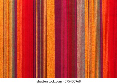 Colorful striped fabric texture in a close up view