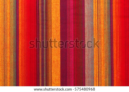 Colorful striped fabric texture in a close up view