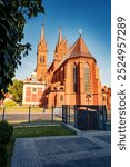 Colorful summer cityscape of Wloclawek town, Poland, Europe. Beautiful morning view of Basilica Cathedral of St. Mary of the Assumption. Traveling concept background.