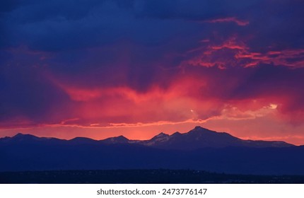 colorful Summer sunset over  long's peak and the front range of the  Rocky Mountains of colorado, as seen from Broomfield  - Powered by Shutterstock