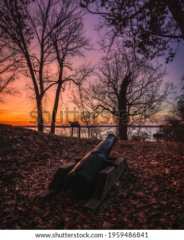A colorful sunrise of a canon emplacement at Leesylvania State Park, which was a Confederate lookout point along the Potomac River during the Civil War.