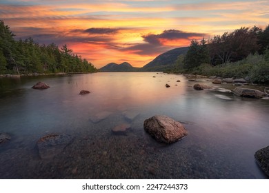 Colorful sunrise at Jordan Pond in Acadia National Park Maine 