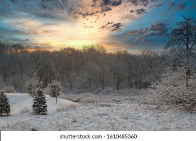 Colorful Sunrise Over The Snow Capped Countryside In Chester County, PA.  