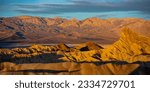 colorful sunrise in zabriskie point, death valley national park, california, usa; colorful mountains on the desert	