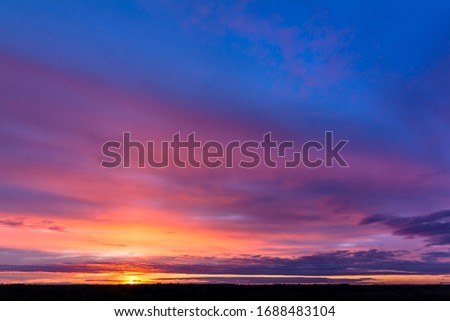 Colorful sunset with clouds in the evening, Russia