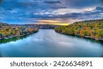 A colorful sunset at Deep Creek Lake during a cloudy evening in the Fall Season