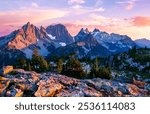 A Colorful Sunset Illuminates the Peaks of Summit Chief Mountain, Chimney Rock, Overcoat Peak and Snoqualmie Mountain Near Tank Lakes. Alpine Lakes Wilderness, Washington.