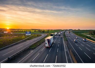 Colorful sunset at M1 motorway near Flitwick junction with blurry cars in United Kingdom - Shutterstock ID 726461932