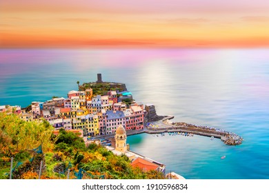 Colorful sunset on Vernazza in cinque terre on the mountain near mediterranean sea in liguria - Italy