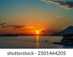 Colorful sunset over Adriatic sea coast in Dubrovnik, Croatia