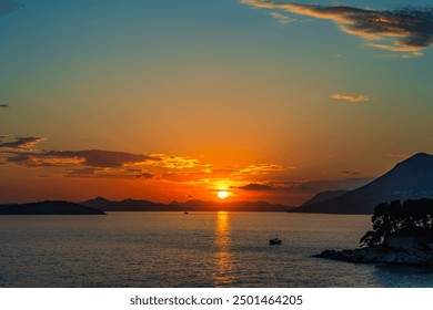 Colorful sunset over Adriatic sea coast in Dubrovnik, Croatia - Powered by Shutterstock