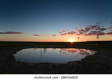 Colorful Sunset Over Everglades National Park, Florida Reflected In Tranquil Water Of Solution Hole In Hole-in-the-Donut Habitat Restoration Area.