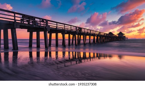 Colorful sunset over the Naples Pier, Naples, Florida, USA