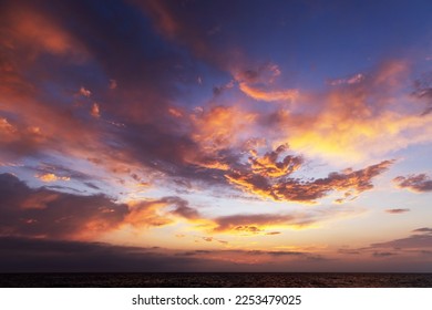 Colorful sunset over ocean on Malibu beach, California