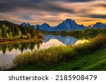 Colorful sunset over Oxbow Bend of the Snake River and Mount Moran in Grand Teton National Park, Wyoming, USA. Long exposure.