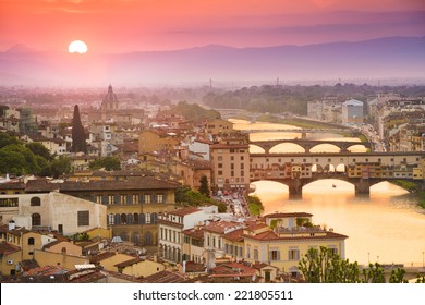 Colorful sunset over Ponte Vecchio on Arno River, Florence, Italy