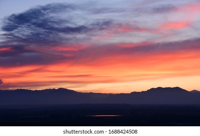 Colorful sunset over stearns lake and the front range of the colorado rocky mountains as seen from broomfield, colorado - Powered by Shutterstock