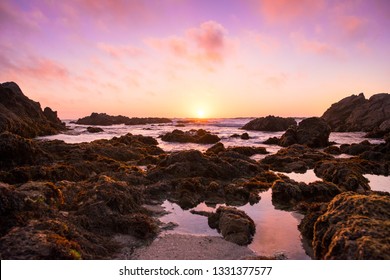 Colorful Sunset Over The Tide Pools In Monterey, California