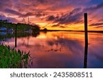 Colorful sunset sky reflected on Apalachicola bay