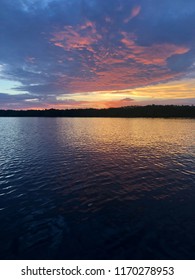 Colorful Sunset With Treeline Taken On A Boat In The Gulf 