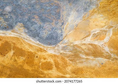 Colorful Surface Of Abandoned Pyrite Mine Tailings. Mining Background, Aerial View Directly Above
