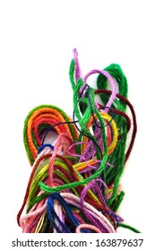 Colorful Tangled Yarn Threads On White Background. Selective Focus Macro.