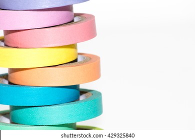 colorful tape rolls background on white