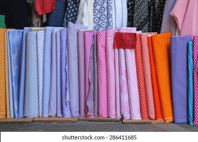 Colorful Textile Fabric Rolls In Material Shop